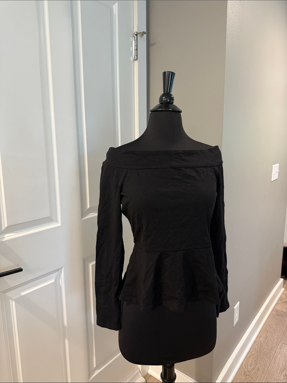BCBGMaxAzria Black Off-Shoulder Peplum Top